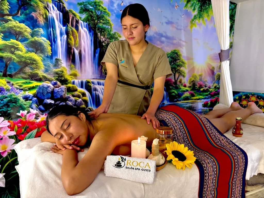Therapist giving a relaxing back massage at Roca Salon Spa in Cusco